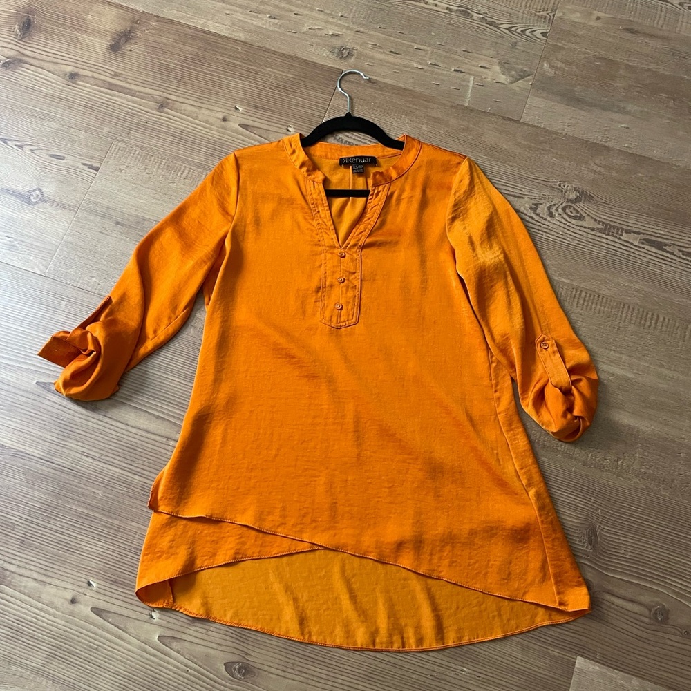 Remuar xs orange tunic.  Longer length.